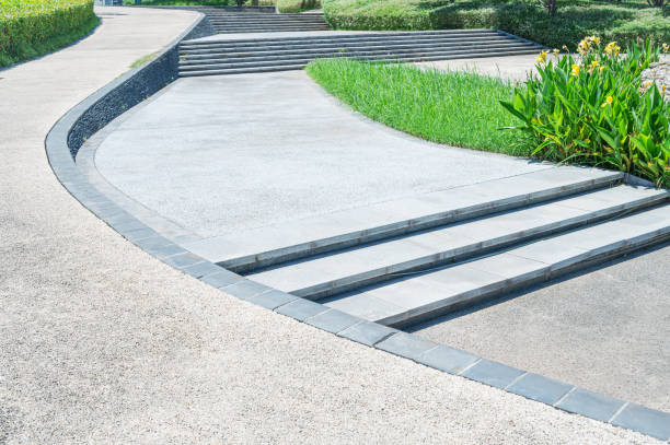 Curved pathway and stairs through the lush green park